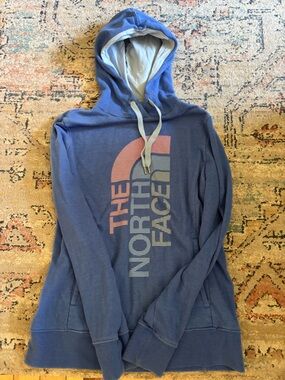 The North Face Blue Hoodie with Pink Logo Accent